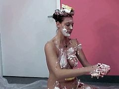 Naughty brunette with big appetizing assets smear whipped cream over her gorgeous body. I would like to lick cream off her appetizing big boobs.