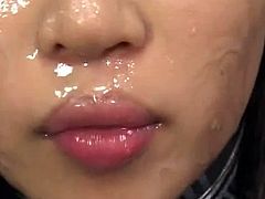 Hairy japanese teen receives warm loads splashing her face and filling her mouth