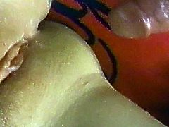 A pretty brunette fingers her pussy and fucks it with a toy on the bed. Then she allows her man to lick her snatch and can't help but moan loudly with pleasure.