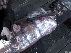 This is a very cruel act of sadism towards this sexy blondie Dia Zevra. She gets taped all over her body first and then tortured deep in her muff.