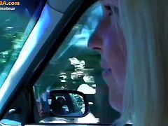 Watch these two naught amateur couple in the car.His horny blonde babe can't wait to get home, so she grabs his big cock and start sucking it, while he keeps on driving.