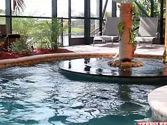 Beautiful tall lesbian twin girls swimming in the pool and getting naughty with each other! Watch them rubbing their sweet titties! One girl pours oil on the other and massages it all over her body!