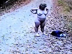 Mature Nude Female Undresses in Woods