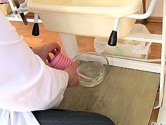 Bohunka quietly sits on the gynecologist table and opens her legs as wide as she can. She's a filthy whore and had way to many cocks and cumloads in her pussy so now it's time for a clean up! For that she needs her doc that does a great job flushing away all the mess in her pussy. Will he fill it up with cum too?