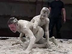 Dean Tucker and James Hamilton fight like Spartans in the dirt. Then the losing dude gives a blowjob to the winner and gets ass fucked doggystyle.