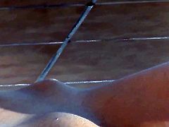 With clean snatch bares it all and masturbates in closeup