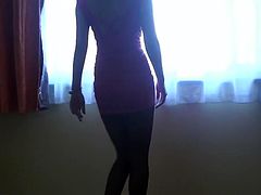 Sluttishly looking Asian girlfriend teases you with hot sexy legs in black pantyhose. She looks extremely hot. Just enjoy watching her for free.