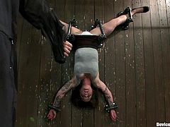 Kinky brown-haired milf Vivienne Del Rio gets chained and hung head over heals in a basement. Then somebody hangs leads to Vivienne's nipples and the bitch loves it much.