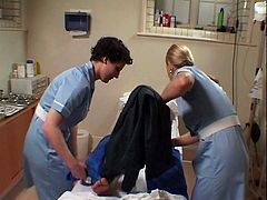 See two naughty nurses washing a beefy guy's body. They definitely take their time to do their job well and her certainly appreciates it.