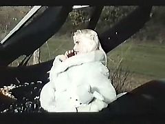 Seductive blonde hoochie is ready to please you right here and right now. Just enjoy watching her insatiable pussy while she spreads her legs in the car.