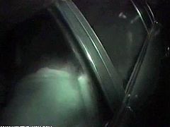 Inside of dark car, a man was over a woman on the seat. The woman was so horny that she willingly took off her underpants to fuck.