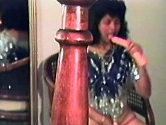 Salacious Latina is getting naughty with her man in vintage homemade clip. She sits down on the guy's boner and rides it and then stands on all fours and enjoys doggy style sex.