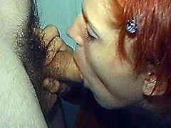 Horny redhead girl takes her dress off and comes up to a guy. She gives him hot blowjob in close-up scenes. She really enjoys sucking that cock.