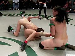 Two teams fight in a ring. The girls from the losing team get their pussies fingered and toyed. Watch and enjoy this amazing lesbian orgy.