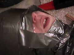 Wasteland brings you a hell of a free porn video where you can see how a hot and wild slave gets covered in duck tape and tortured by her master before he vibrates her cunt.