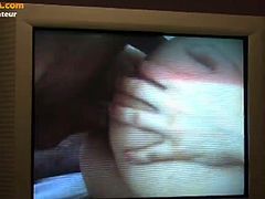 This 100% amateur chick sucks her partner's cock as she's rubbing her hairy cunt. She has big tits and an overall naughty attitude for an amateur performance.