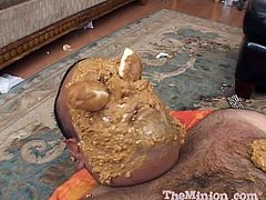 Fat guy hammers her doggystyle then lays back and enjoys it as she works his cock while rubbing his body in peanut butter.
