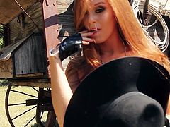 Touch yourself watching this long haired redhead, with giant bazookas wearing a fuchsia bra, while she shows her born beauty in a solo model video.