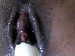 Amateur masturbation of a black pussy