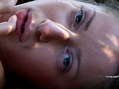 Shameless tramp with tiny tits and trimmed pussy gives a closeup of her slit as she masturbates