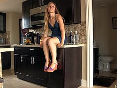 Cute girl Brianna is getting naughty in the kitchen. She sits down on the kitchen counter, spreads her legs wide and fingers her cunt till she gets an orgasm.