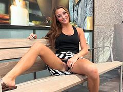 Beautiful brown-haired girl sits on a bench in the street. She lifts a skirt up to show her sexy legs and booty. Then Mary goes inside a building and takes off her clothes there.