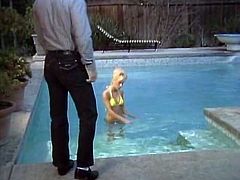 Tight blonde babe takes sunbath over the pool. One cocky boy joins her and attacks her delicious cunt with his tongue. Chick gets her hairy muff licked and fucked doggystyle.