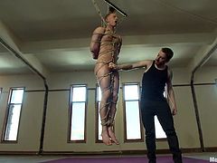 Matthews is hanging around with his executor. Oh yeah, he hags tied up tightly while the guy rubs his dick. Matthews loves to be treated like a cheap piece of meat and he enjoys every moment. Maybe after all that hard cock rubbing he will receive some spanks and something that will make him cum