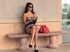 Brunette bombshell Shazia is getting naughty in the street. She shows her natural tits and cute ass for the cam and then fingers her snatch and moans with pleasure.