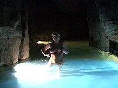 Delightful Alison Angel has a vacation. She swims in a hotel swimming pool at night. She pulls down a bikini bra to show and lick her big natural boobs.
