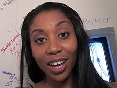 Black girl with an engaging smile takes off her clothes. She lovely babe gives a handjob and plays with her pussy at the same time.