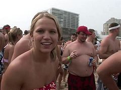 A bunch of fuckin' slutty bitches in bikini at the bitch, being fuckin' sluts and stuff, check it out right here, it's fuckin' hot!