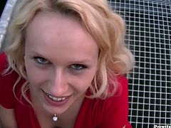 Shiny curly haired blondie in sexy red dress walks around the streets showing off her long legs. She meets some stranger and gets ready to suck his dick...