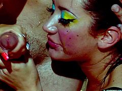 Two babes, one blonde and one with brown hair, are in the spotlight in this video. Their provocative looks and artistic makeup and outfits seduce their male companion. Sensual touches, licking and cock sucking, are some of the few things happening here. To convince yourself, click and get carried away by the atmosphere!