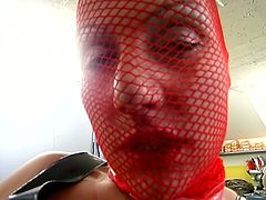 Nasty solo masturbation scene where a horny fetish chick in a red mask and latex uses a toy to pleasure her wet pussy