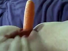 Girl have fun with a carrot