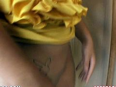 Playful chick Spencer Sage squeezes her boobs in the beginning of the porn video. Then, she gets rid of her panties showing fine booty and shaved pussy. Spencer Sage kneels down spreading her legs apart. She rubs her pussy in front of the camera.