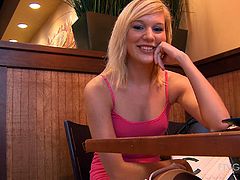 Gorgeous blond siren is having fun in the cafe. She hates wearing bra and you can see her nipples, sticking out of her shirt.