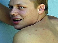 See this blonde twink playing with his hard rod of meat by the poolside in this sexy solo video.