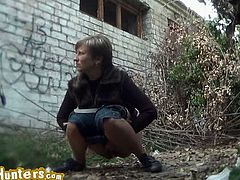 Piss Hunters brings you a hell of a free porn video where you can see how this horny blonde belle poses and pees outdoors while assuming some very naughty poses.
