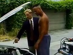 Have a good time watching a blonde dude, with a nice body wearing a suit, while he fucks a guy's ass after this one fixes his car.