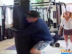 This young nymph sneaks in the gym room with her boyfriend while she's still at work. He fucks her face and then she goes back  to work.