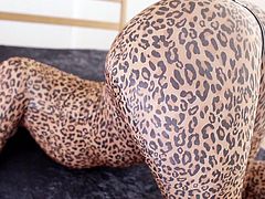 Are you a fan of Japanese hot ladies? Let your fantasy flourish. The babe in this video is wearing a kinky one piece costume with leopard print. The bitch looks simply ravishing while posing in sexy positions on the floor. The camera catches closeups of her juicy pussy being fingered. Click!