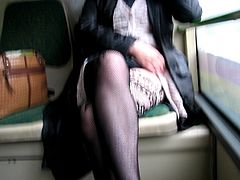 Chick flashing fashion stockings in a bus