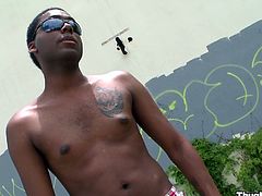 Kevin Crows is having interracial gay sex in public. The black dude pleases his buddy with a blowjob and then gets his asshole drilled from behind.