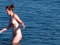 It's a true pleasure for sleazy voyeur to watch such sexy girl exposing her nude forms while at the beach
