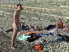 These naked people are all open minded and swingers. They spend the day on a nudist beach where they chat and enjoy the sun, plus the naughty goodies around them.