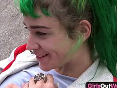Girls Out West brings you a hell of a free porn video where you can see how a green-haired lesbian and her friend play outdoors while assuming very interesting poses.