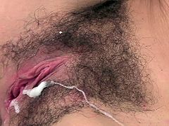 The sexy brunette Lilith Virago gets her mouth around a huge cock and ends up getting a nasty cumshot on her hairy little pussy after a rough fuck.