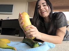 The amazingly sexy brunette teen Nadine will get you really horny as you watch her shoving a huge summer squash up her tight asshole.